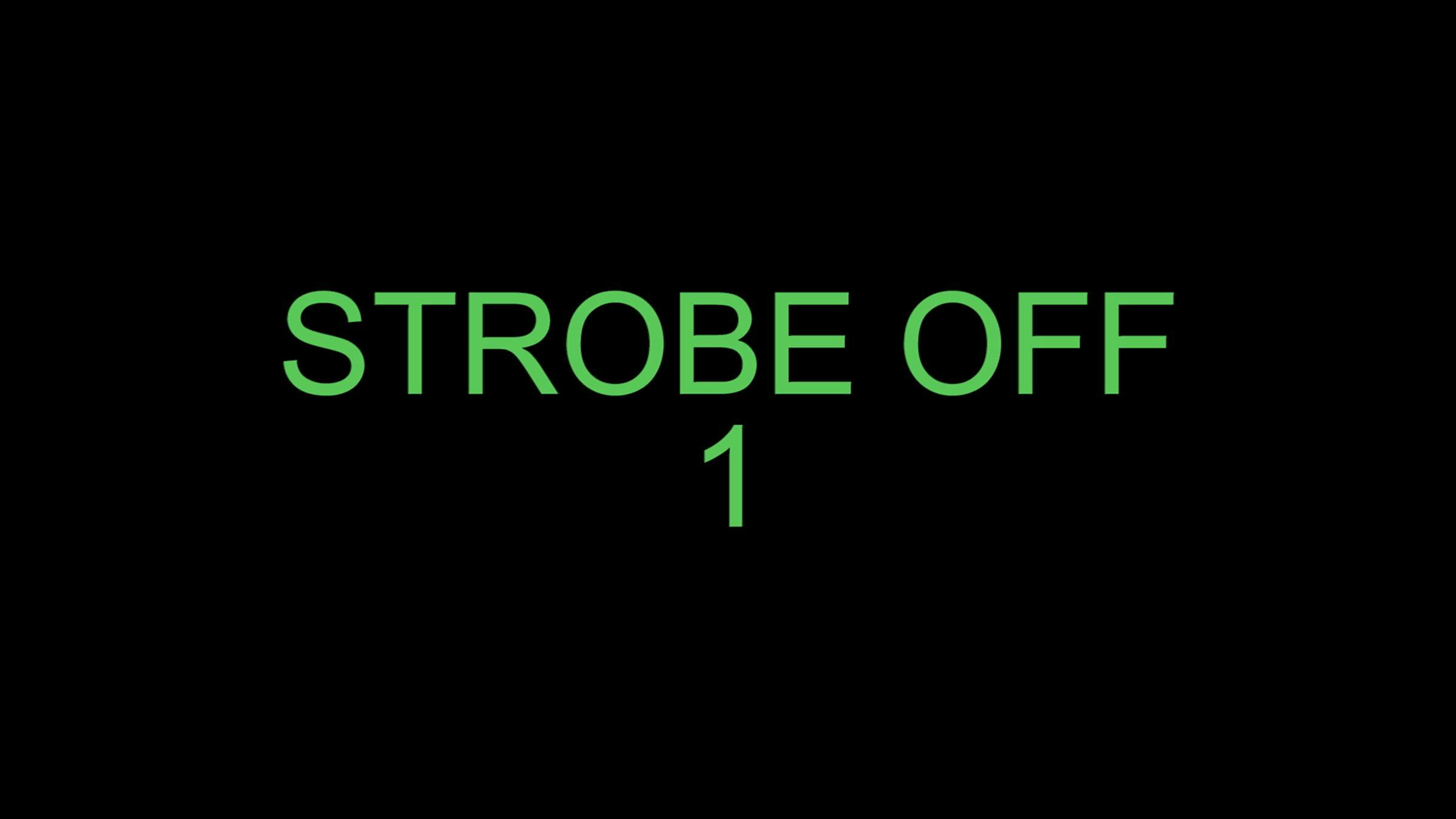 Black image with green texts in capitals which reads 'STROBE OFF 1'.