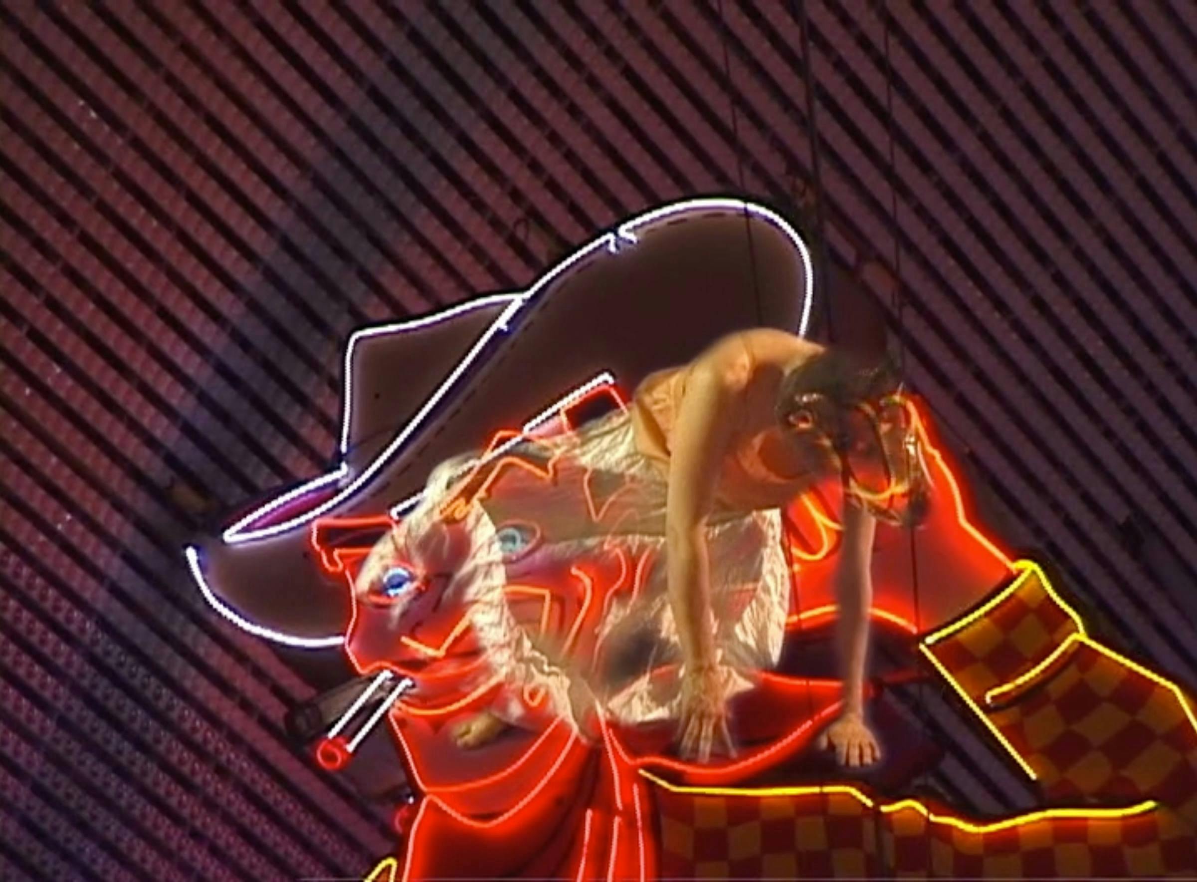 an image of a figure wearing a papier mache wolf head is superimposed on the Las Vegas neon lights, here she is on top of a cowboy smoking a cigarette