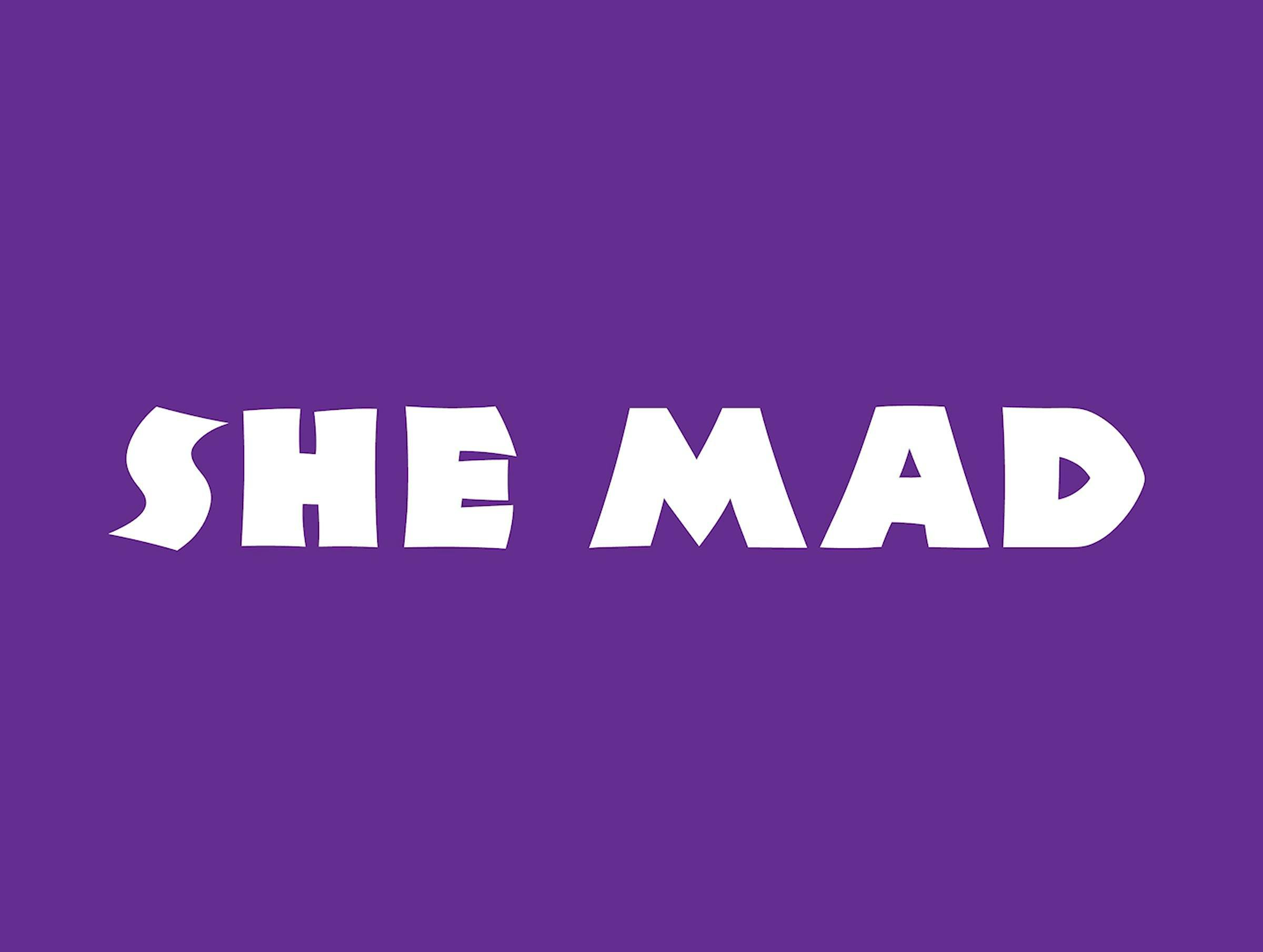 white text 'she mad' is written on a purple back ground