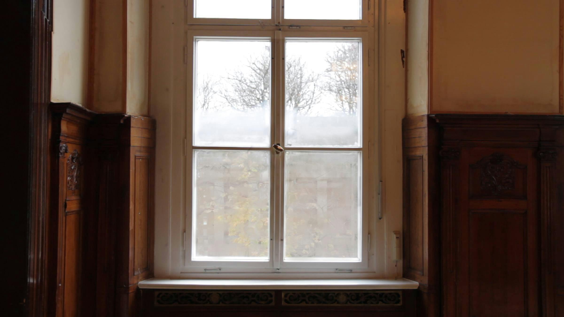 an image of a window covered in condensation