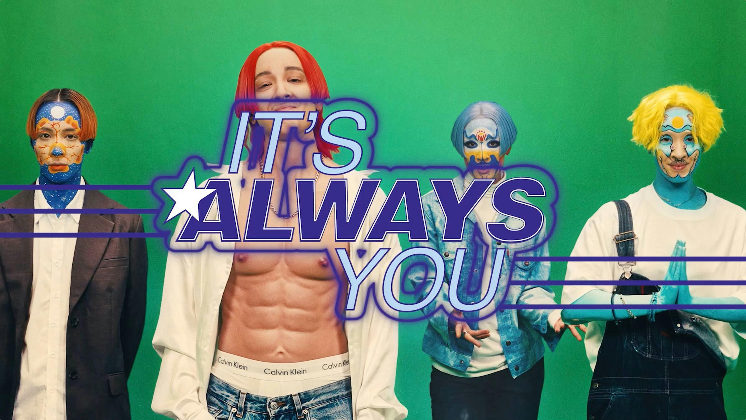 4 characters with orange, red, blue and yellow hair stand in a row, they are seemingly in a boy band. The text 'its always you' is layered in front of them. The back ground is green.